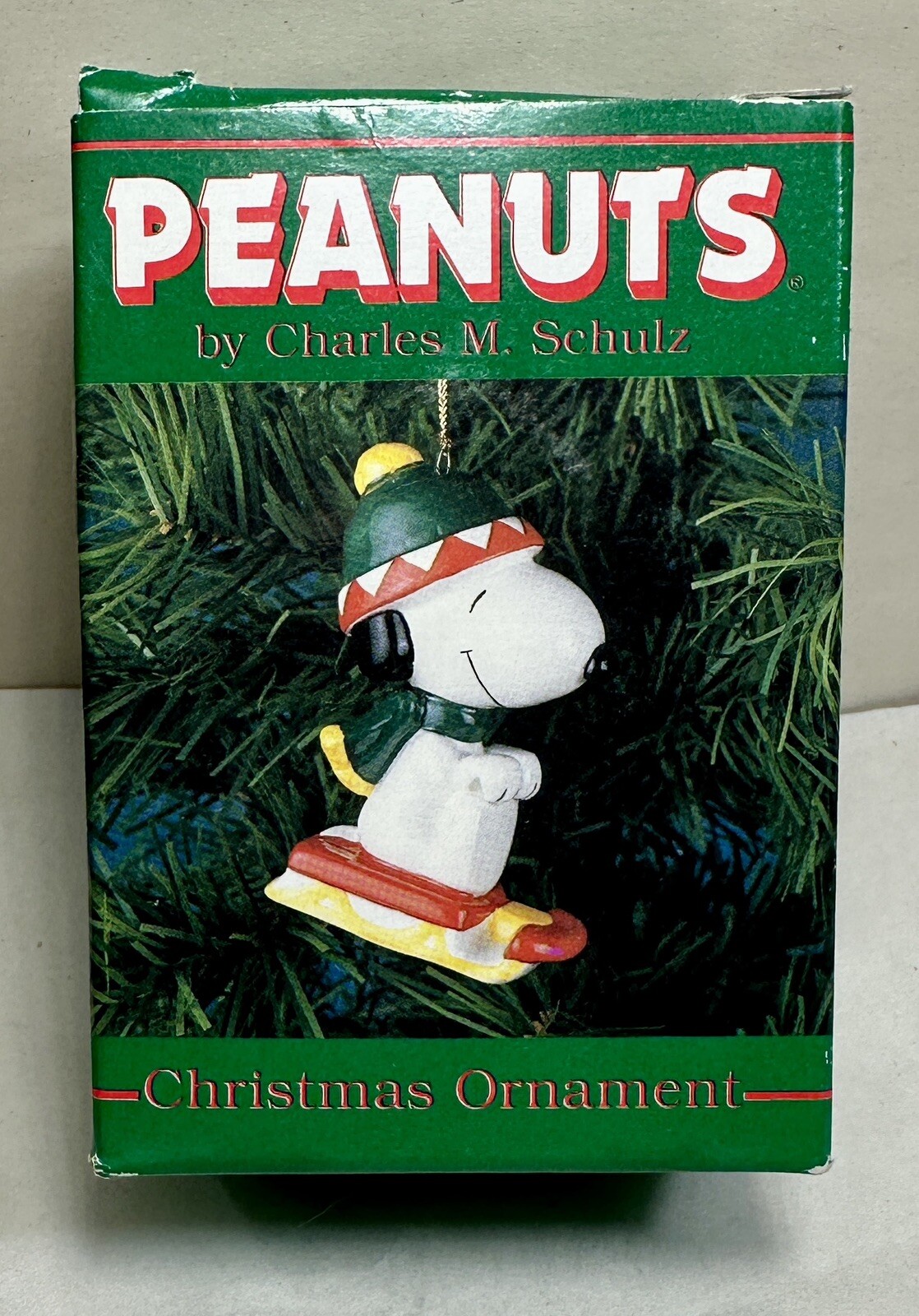 Vintage Korea Ceramic Peanuts Snoopy Christmas Ornament - Sledding - New in Box